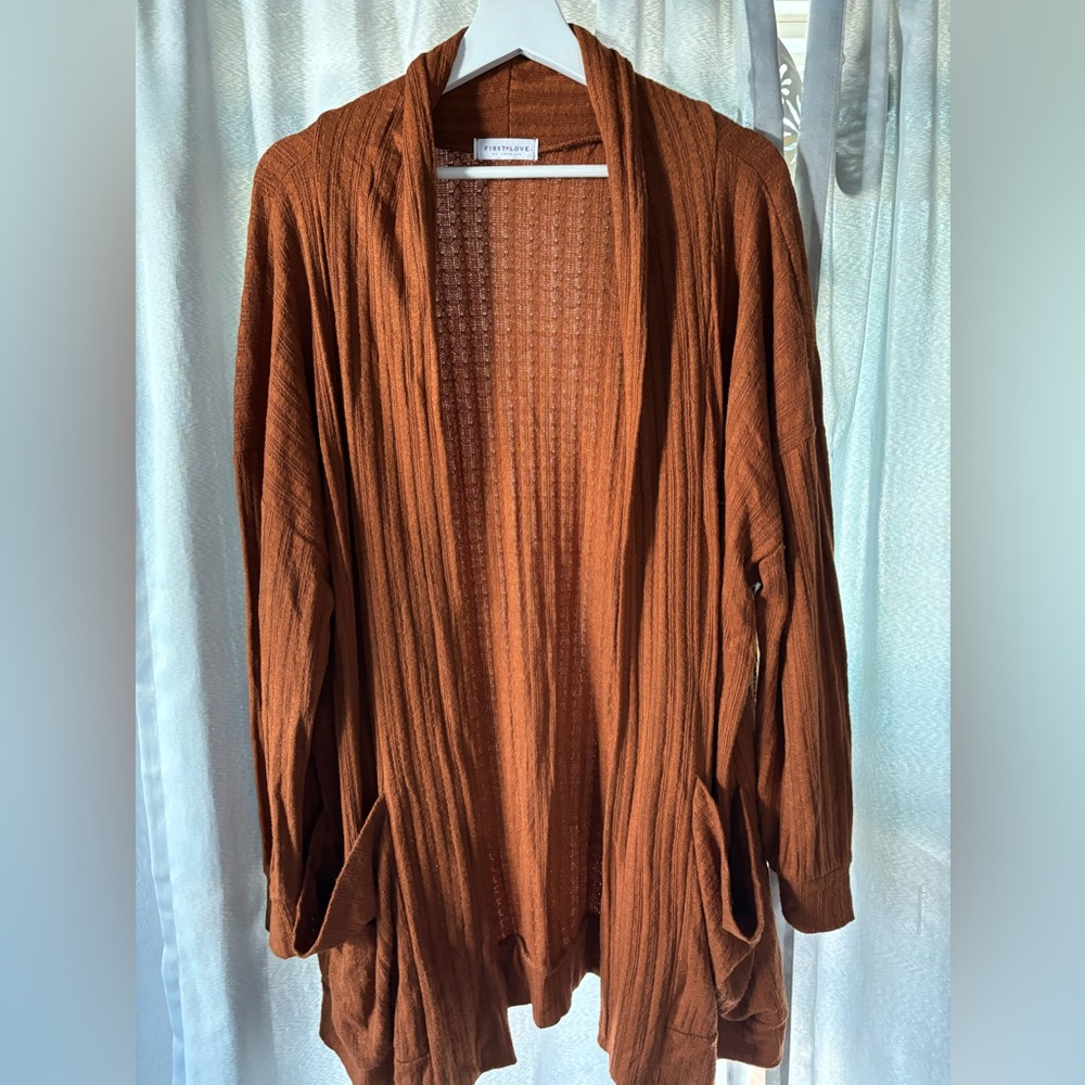 First love women’s open front cardigan size 3XL. Rust. Rayon/poly/nylon blend.